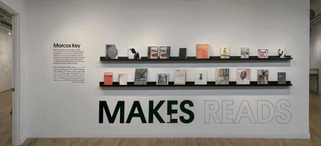 view of books on a dramatically lit wall