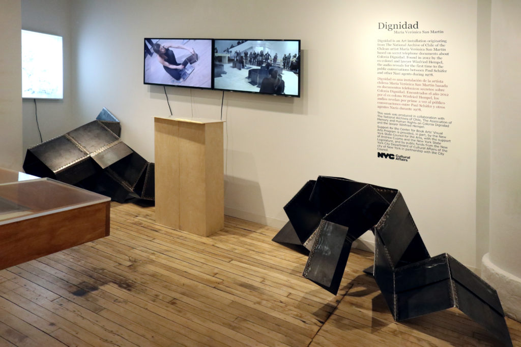 large metal sculptures occupy the floor of the gallery